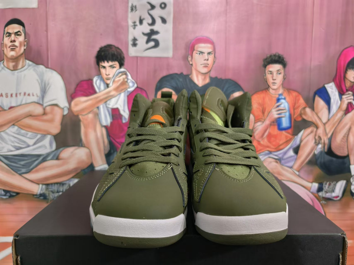 Front view of olive green Jordan high-top sneakers with orange accents and lace-up closure