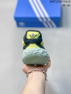 Rear view showing the padded heel, trefoil branding, and textured outsole.