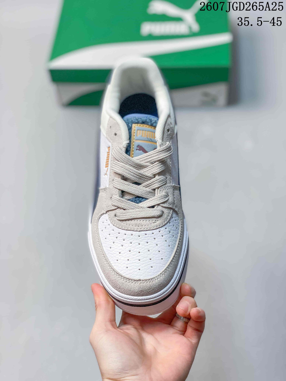 Top view of the sneaker showing the perforated toe panel, laces, and branded tongue.