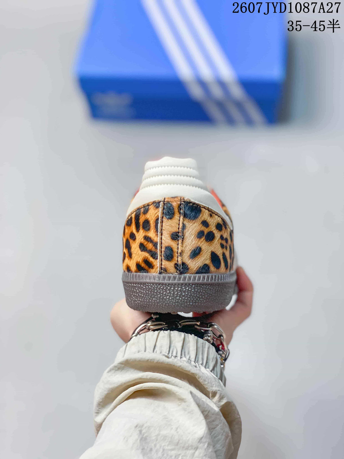 Rear view showing the leopard-print heel, white heel detail, and dark outsole.