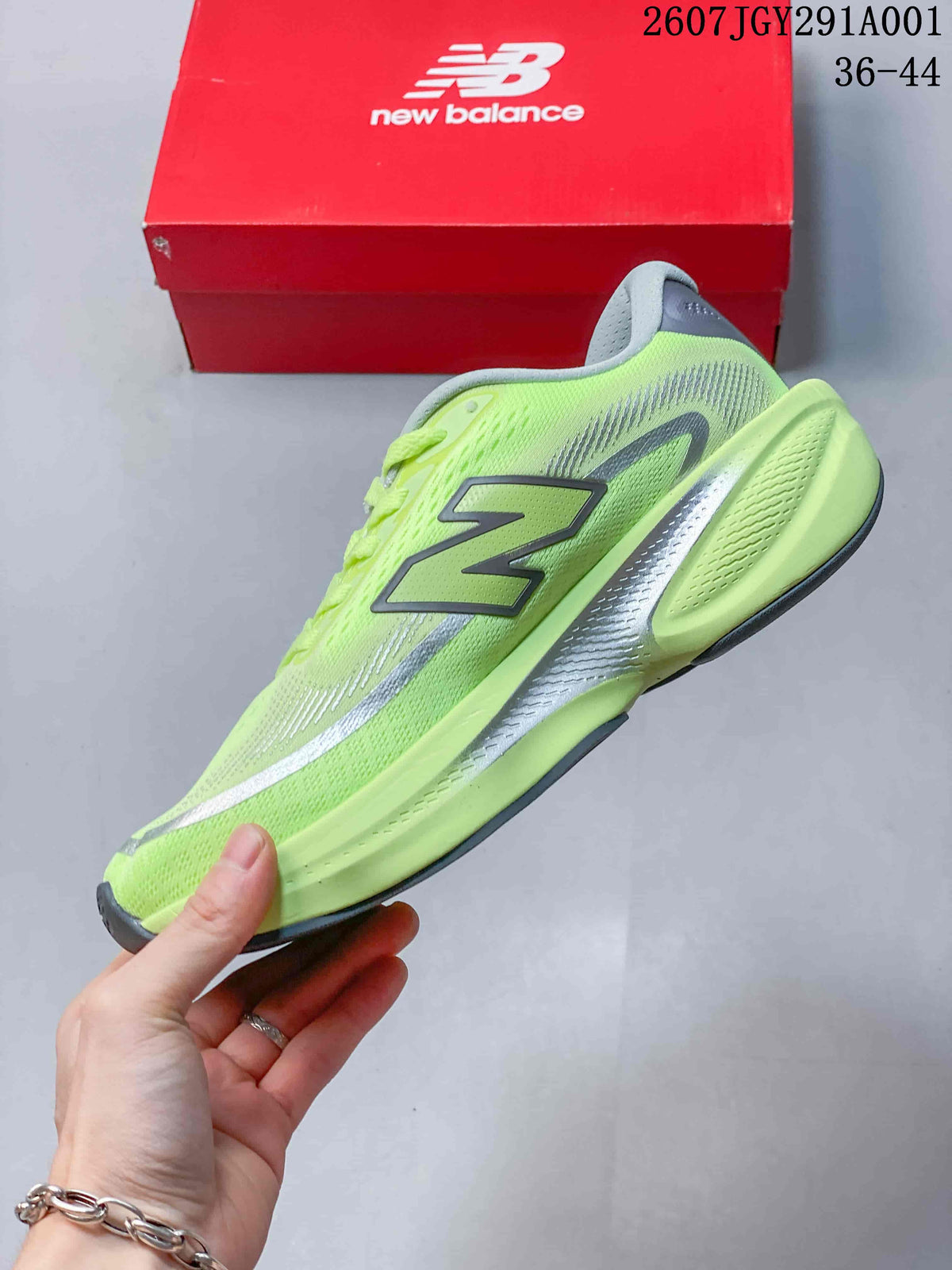Side view of a lime running shoe with gray and silver accents
