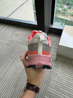 On Running Cloudmonster 5 Sneakers in Pink and Gray