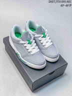 Pair of grey Jordan Air Jordan Sixty Plus low-top sneakers with white and green details