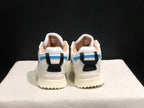 Rear view showing the black heel pull details, blue heel accents, and padded collars.
