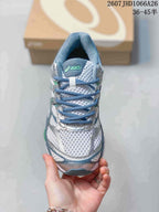 Top view of the ASICS Gel-Cumulus 16 sneaker showing the blue laces, padded tongue, mesh toe box and silver overlays.
