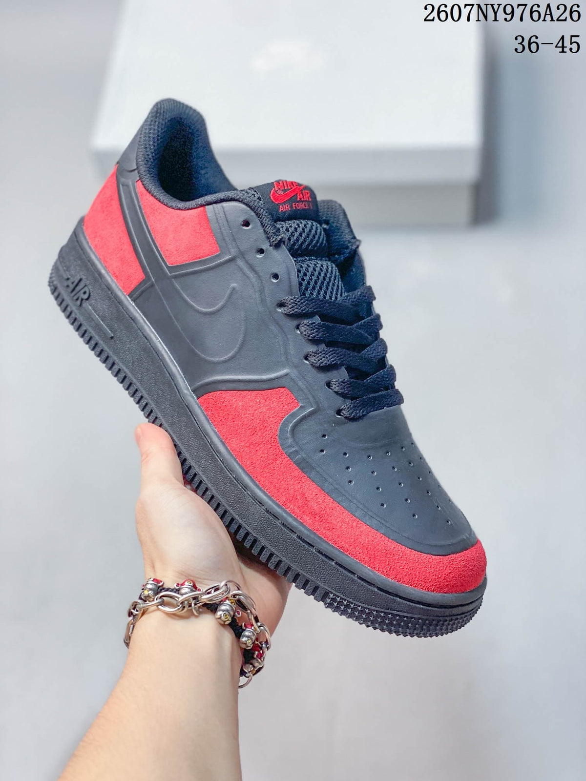 Black and red Nike Air Force 1 '07 LV8 low-top sneaker with matching red accent panels.