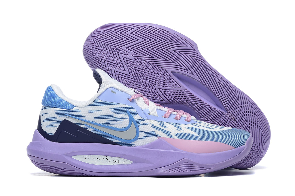 Blue and white patterned basketball shoe with a purple outsole.