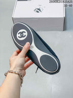 Underside of a trainer showing the gray outsole and size 36 marking