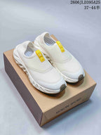 White and dark gray KOLON SPORT Galah slip-on shoes shown together; image also displays a size range.