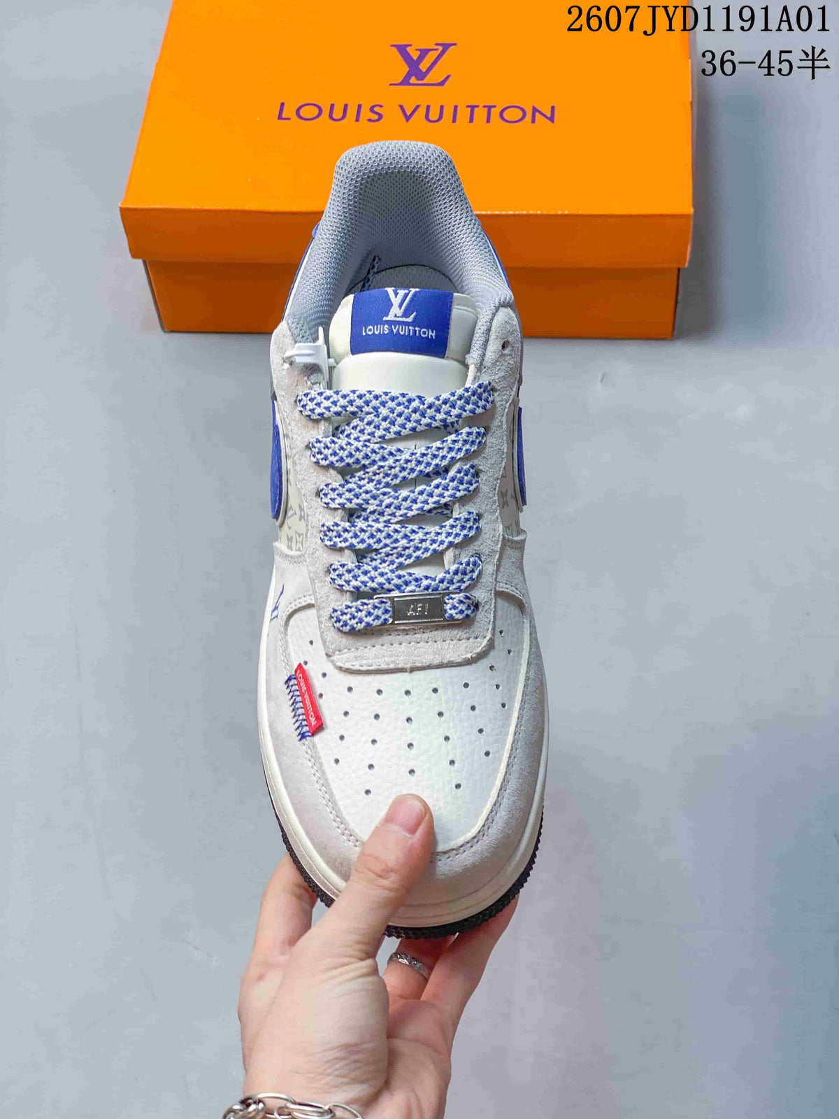 Front view showing the perforated toe, patterned laces and blue tongue label.