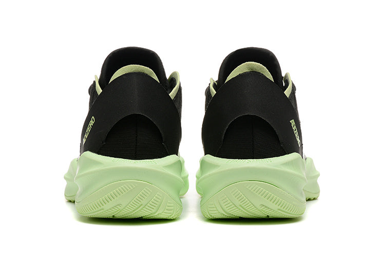 Rear view of pale gray Adidas Adizero shoes with light green soles
