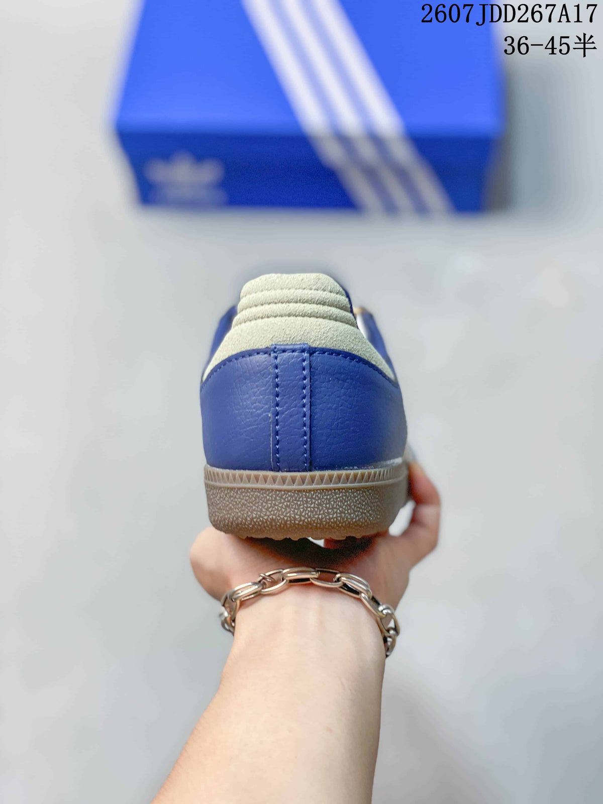 Rear view of the blue sneaker showing the padded heel and gum-colored outsole edge.