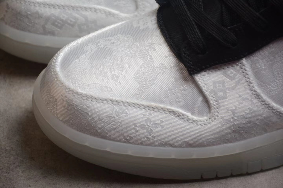 Close-up of the white patterned toe and textured white outsole.