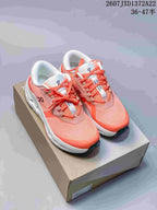 Pair of coral and white On Cloudrunner 3 sneakers displayed on a shoebox, with the style code and advertised EU size range visible above.