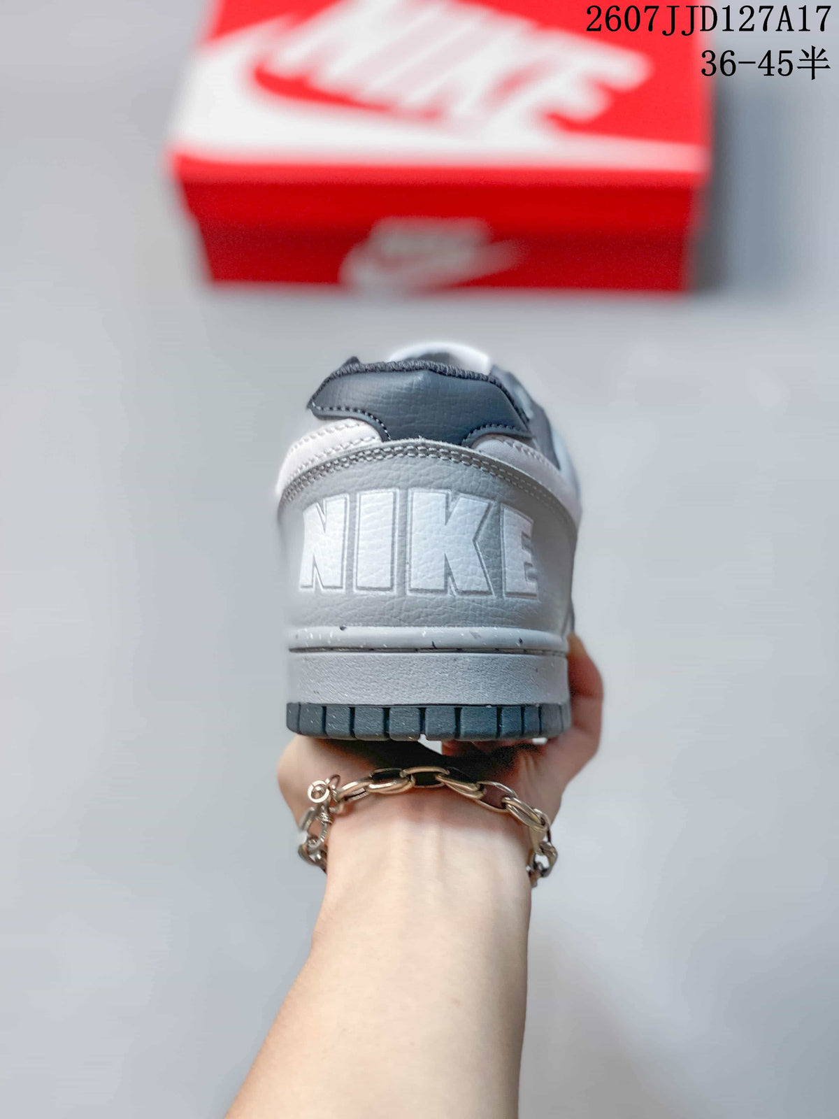 Rear view showing the padded heel area, embossed Nike branding, and dark outsole edge.