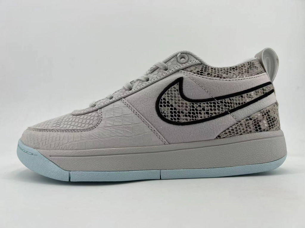 Close side view of the patterned Swoosh and upper panels
