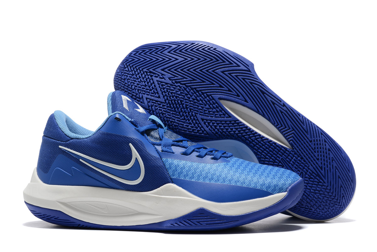 Blue basketball shoe with white panels and a blue patterned outsole.