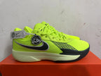 Side profile of bright green Nike basketball shoe with a dark side logo, patterned panel, and pale sole
