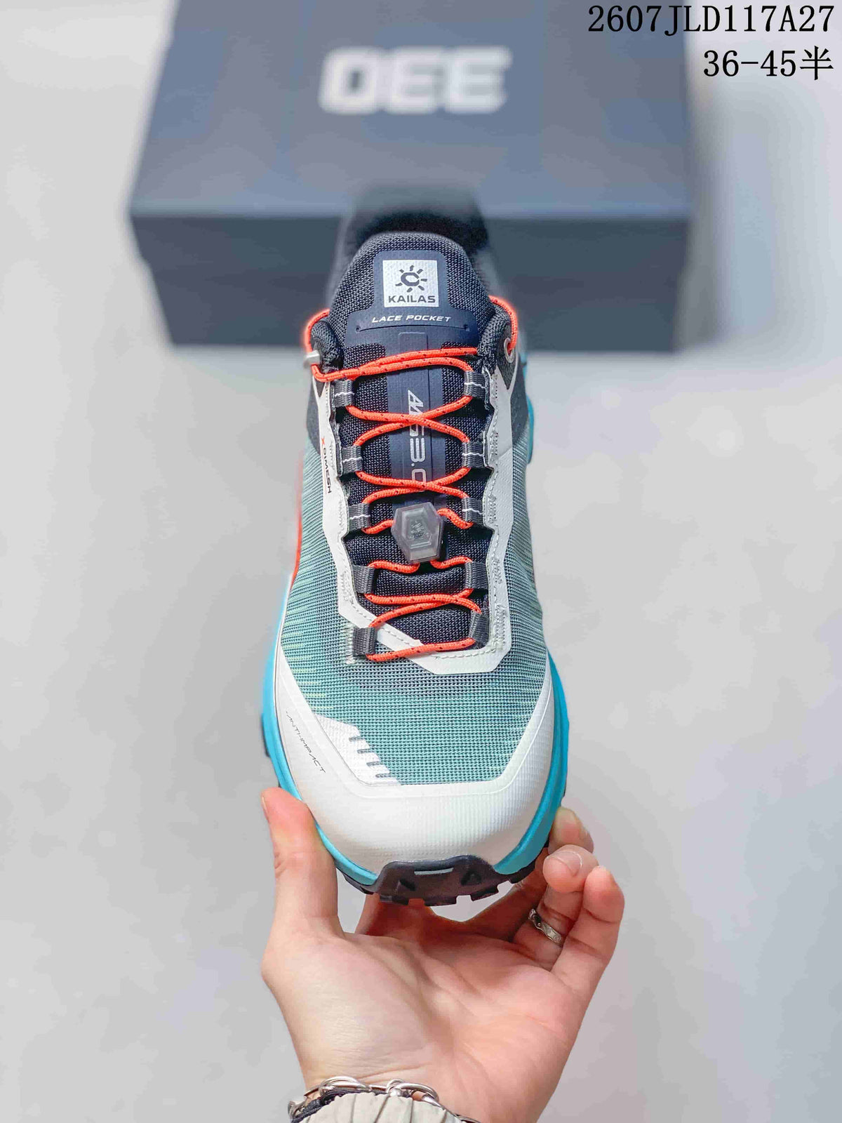 Front view showing the mesh-style upper, orange cord lacing, tongue lace pocket, and protective toe area.
