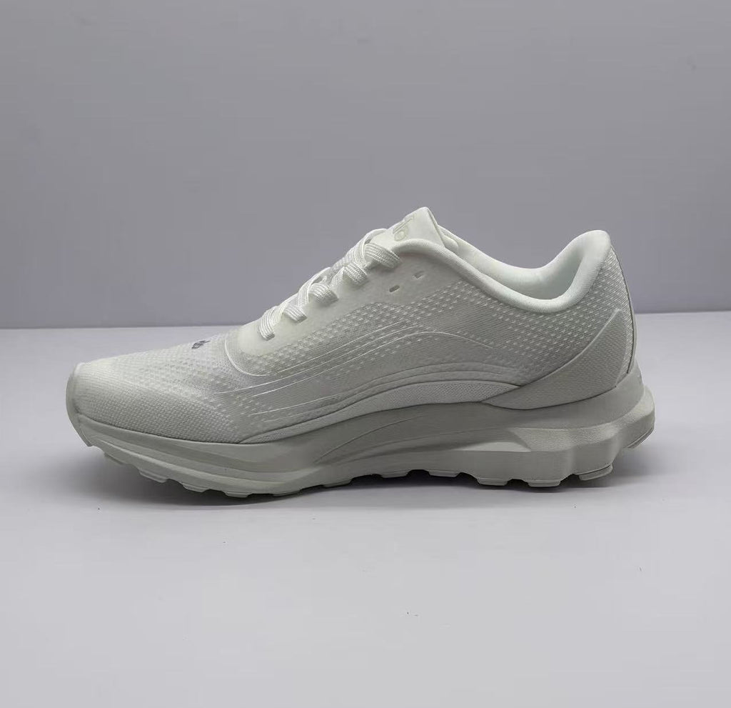 Opposite side view of the all-white Alo sneaker showing the padded collar and raised heel.
