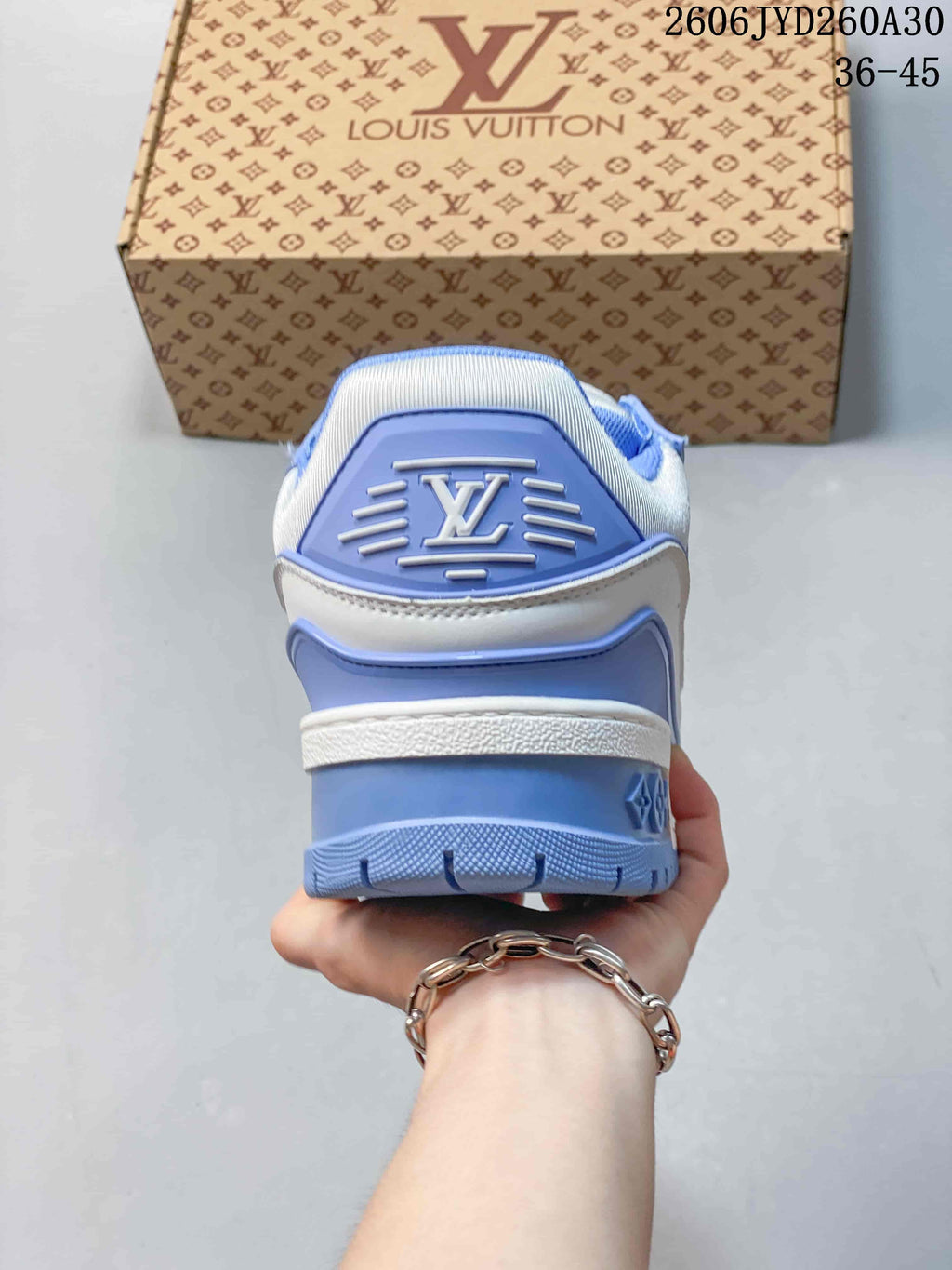 Rear view of the sneaker showing blue heel details