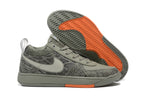 Side view of the sneakers with the outsole tread visible
