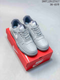 Pair of grey and white Nike SB Dunk Low Pro sneakers displayed on a red shoebox; overlay shows style code JJD127A17 and a size range.