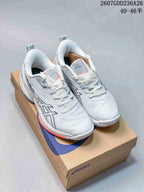White ASICS Swiftace basketball shoes with dark and orange outsole accents displayed on an ASICS shoebox.