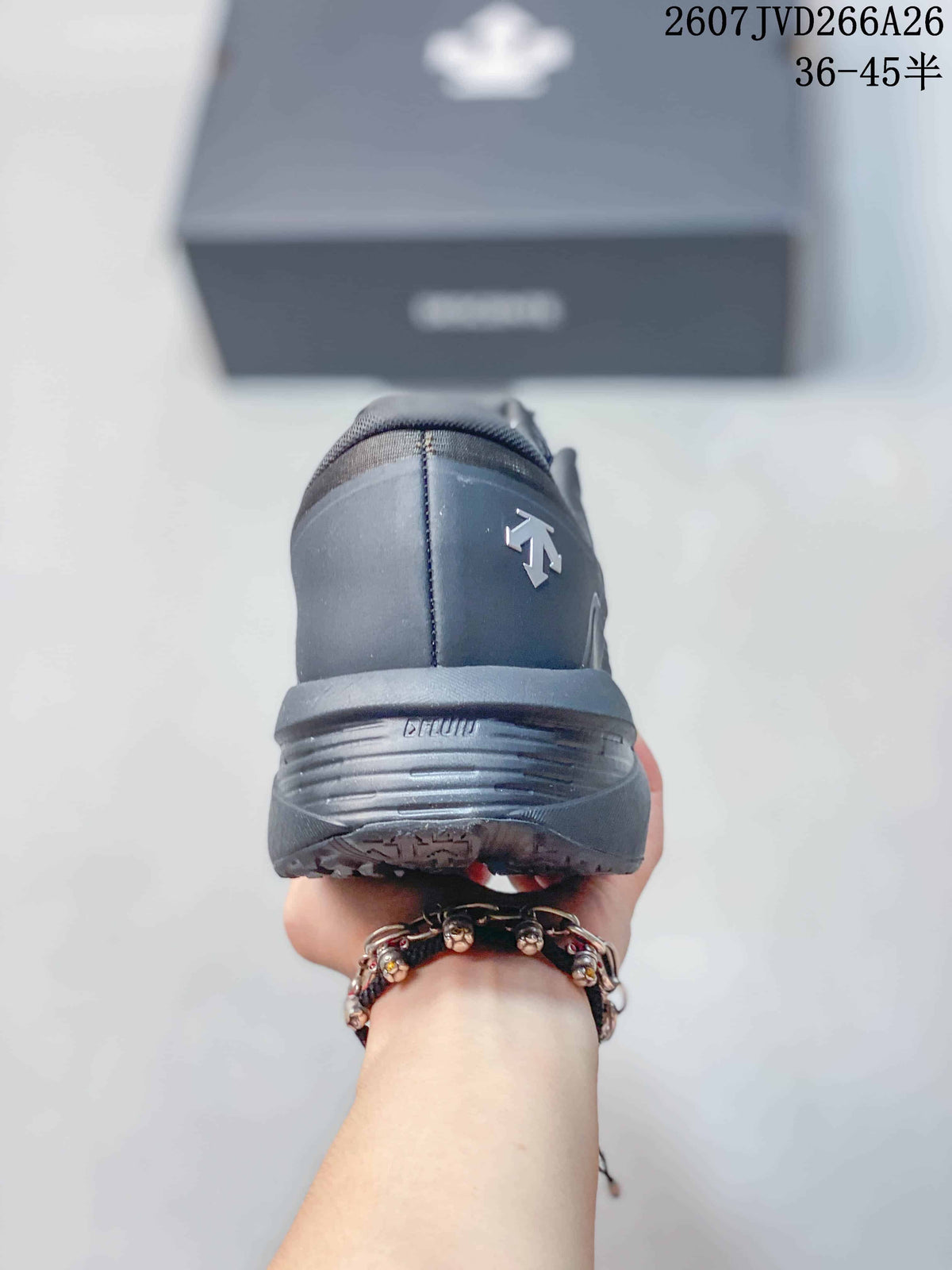 Rear view of the dark gray sneaker showing the heel construction and layered outsole.
