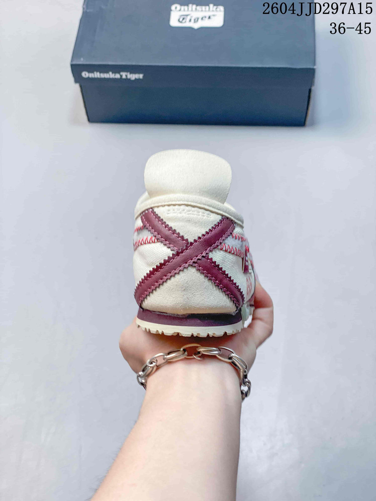 Rear view showing the crossed red side stripes and heel construction