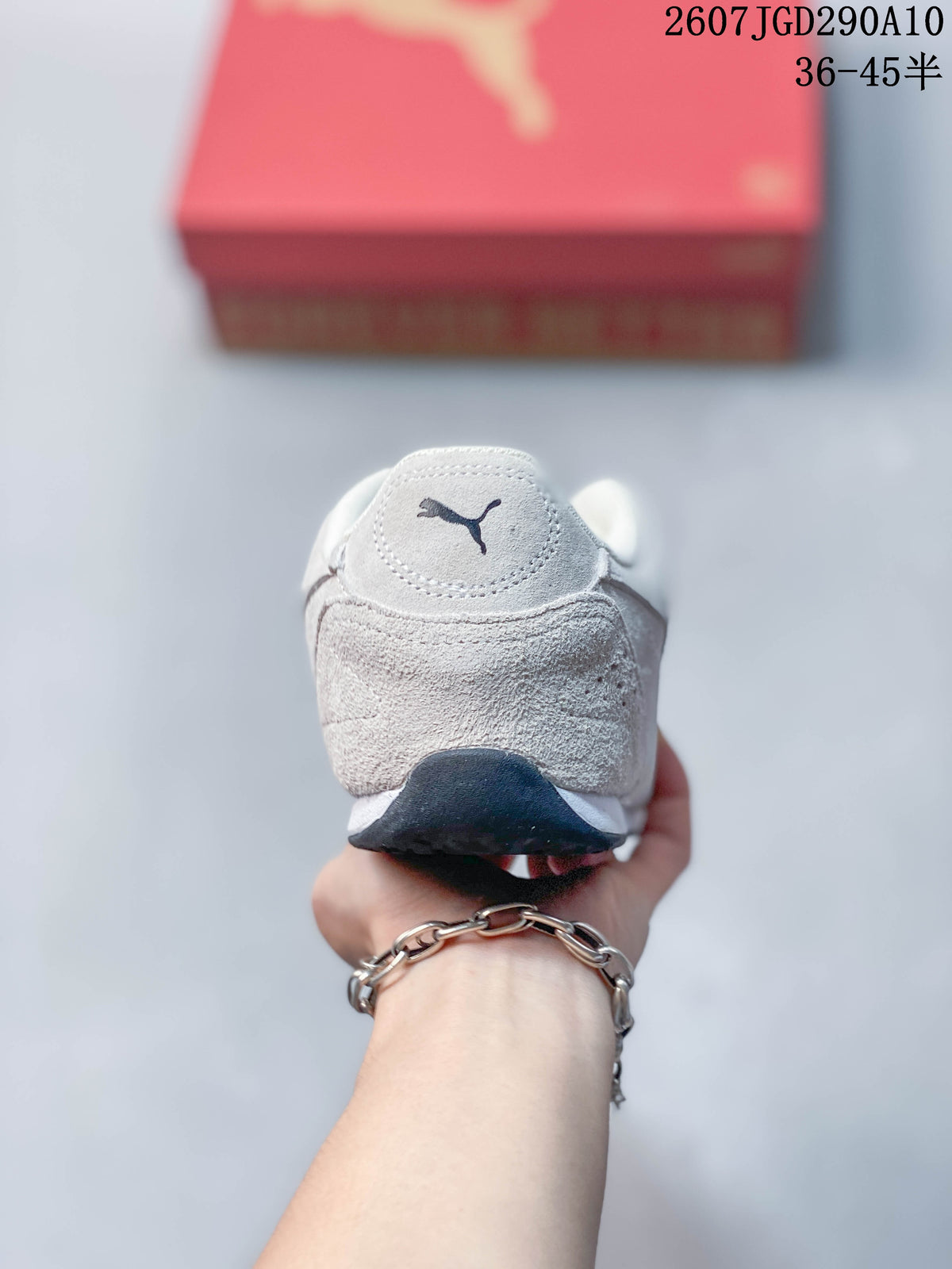 Rear view of the white sneaker showing the padded heel and Puma branding.