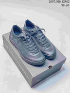 Pair of dark gray Arc'teryx Konseal LT W shoes displayed on a shoe box