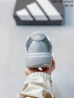 Rear view of the gray running shoe showing the adidas logo, padded heel area, and Adizero Evo SL text.