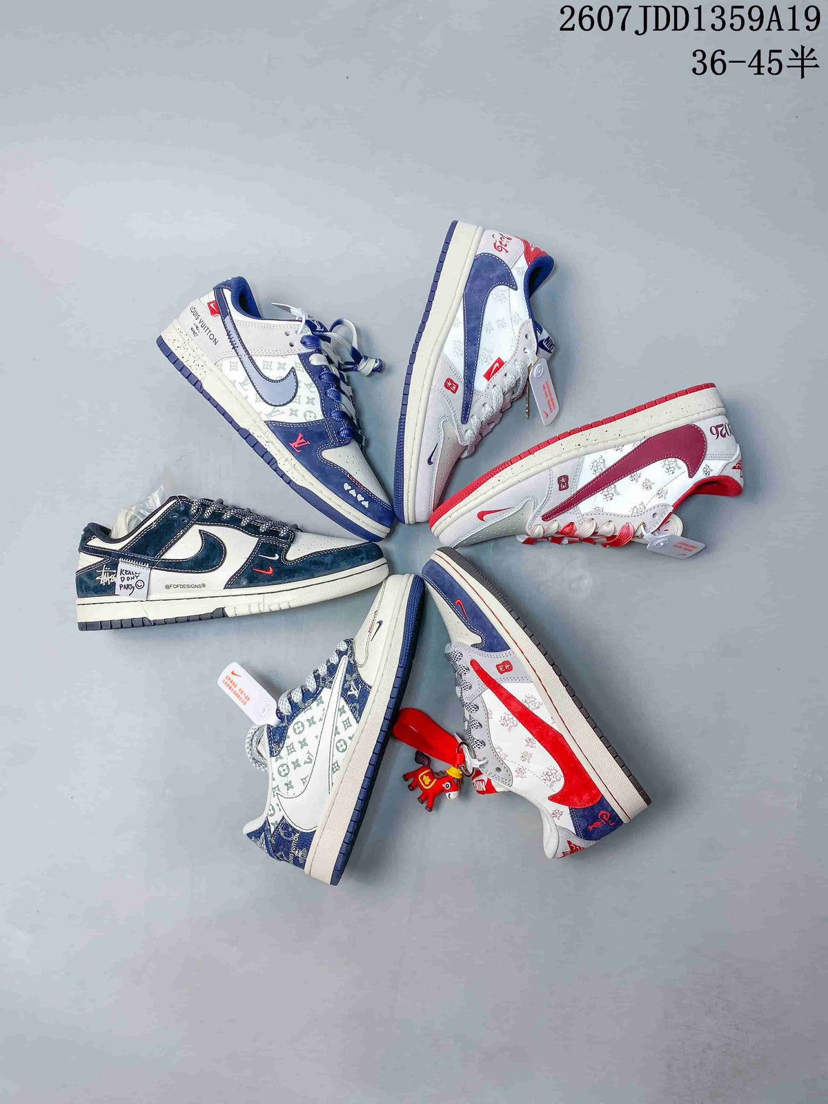 Overhead view showing several low-top sneaker colorways arranged together, including red, blue, navy, and patterned designs.