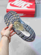 Close-up of the textured outsole and segmented tread pattern on a Nike V5 RNR sneaker.