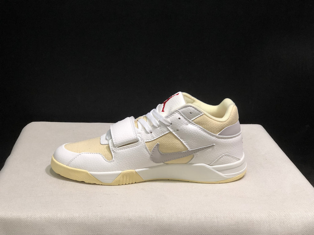 Side profile showing the white upper, grey Swoosh, cream paneling, midfoot strap and cream outsole.