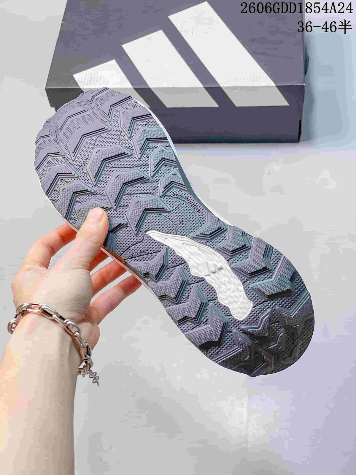 Close-up of the Adidas Holo Peak shoe outsole showing its raised patterned tread