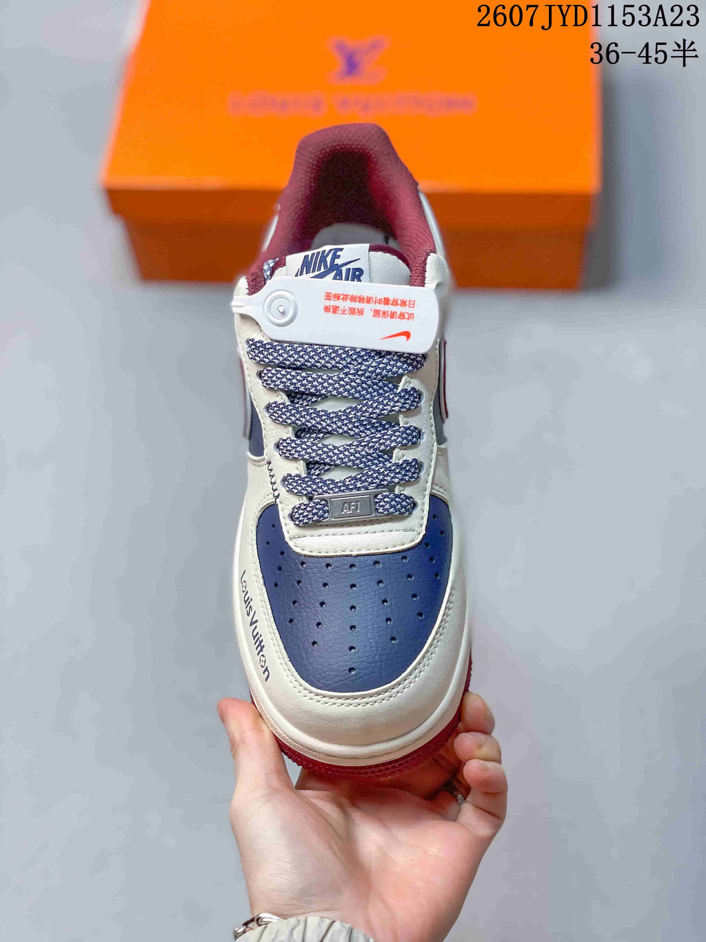 Top view showing the perforated blue toe box, patterned laces and AF1 lace tag.