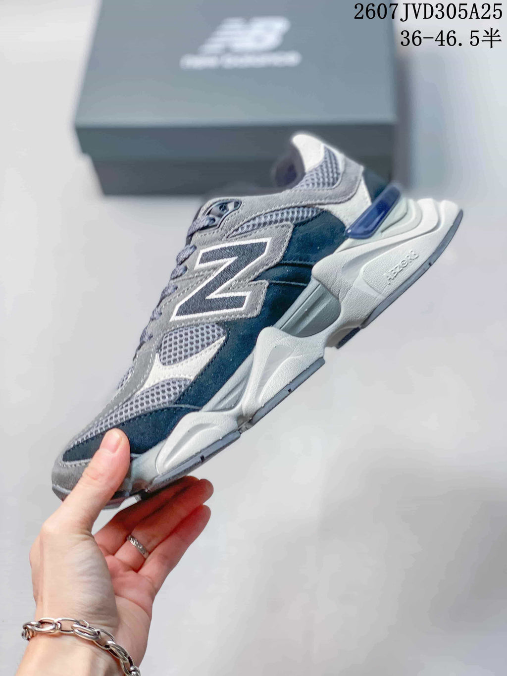 Side profile showing the large N logo, mesh panels, layered upper, and sculpted sole.