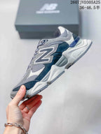 Side profile showing the large N logo, mesh panels, layered upper, and sculpted sole.