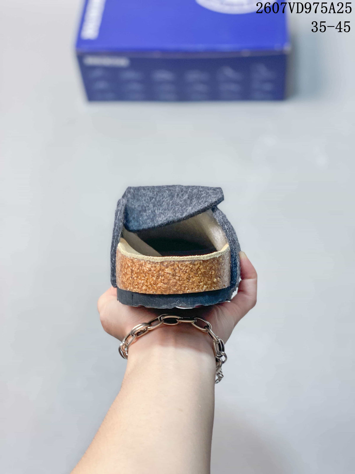 Rear view showing the raised heel area and layered-looking sole edge.