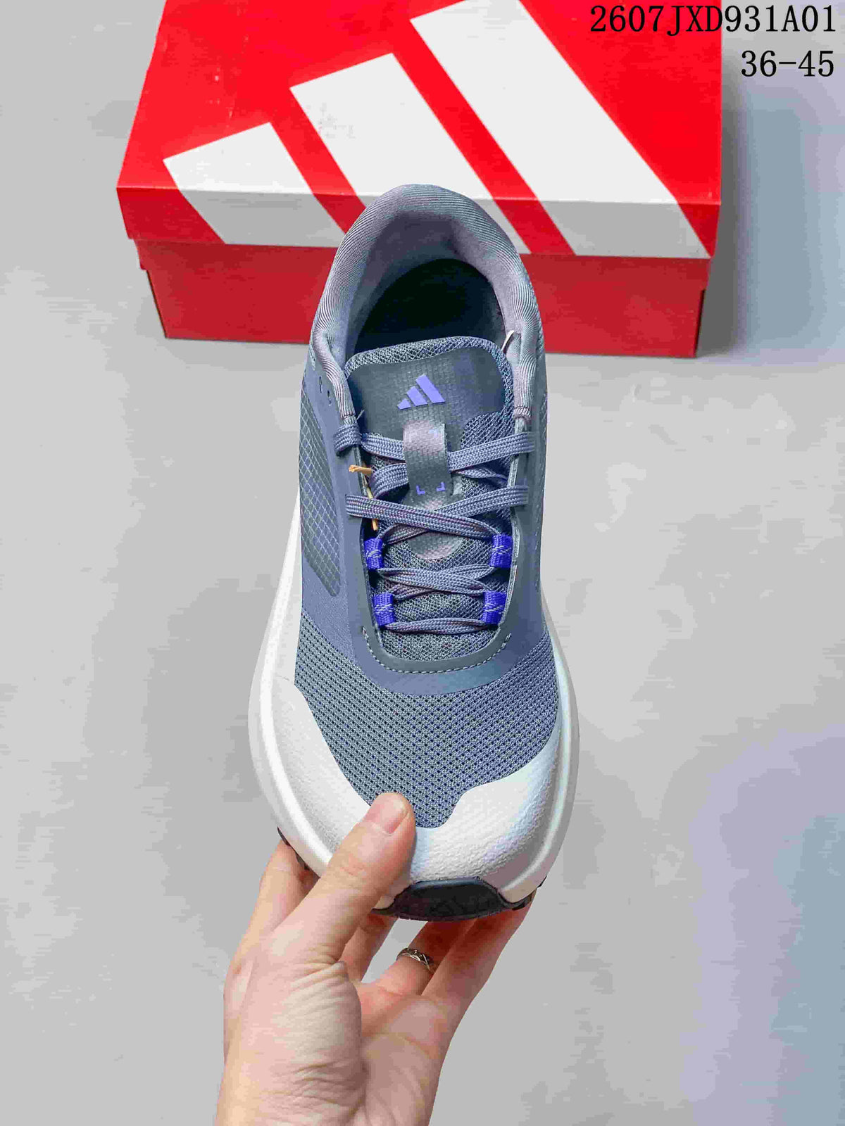 Top view of the gray lace-up sneaker with purple detailing