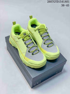 Lime green Kolon Sport low-top sneakers with gray accents