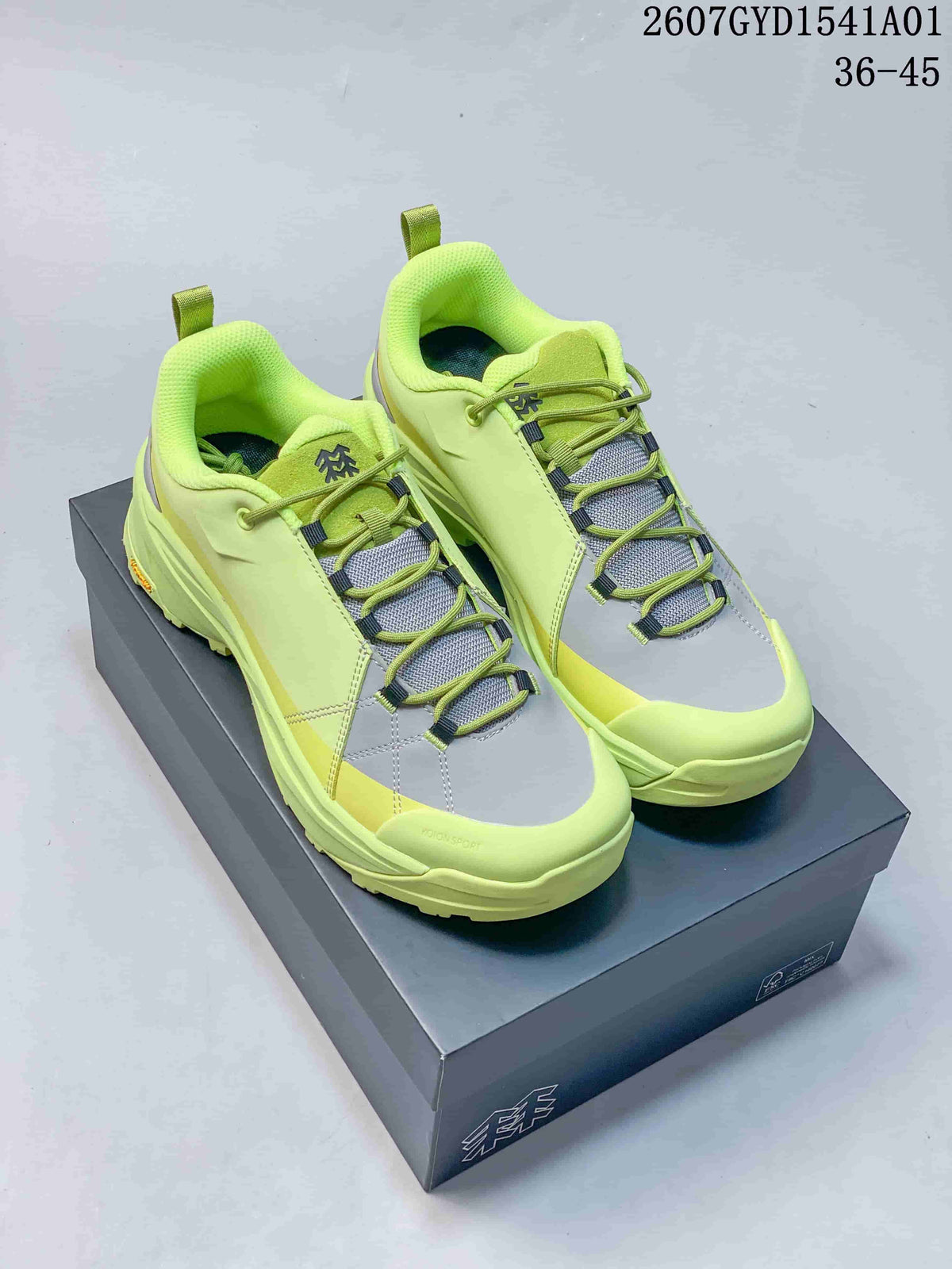 Lime green Kolon Sport low-top sneakers with gray accents