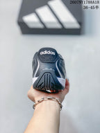 Rear view showing the padded heel and adidas branding on the tongue.