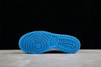 Bottom view of the bright blue rubber outsole showing circular forefoot traction and segmented tread.
