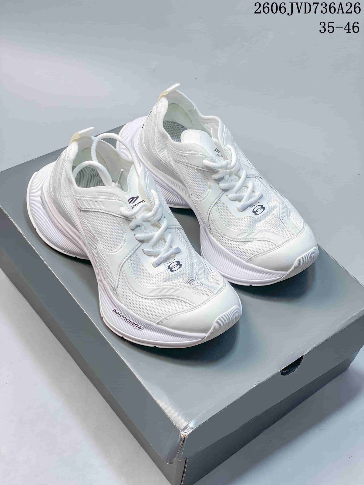 Pair of white Balenciaga Circuit-style mesh sneakers shown from above and at an angle.