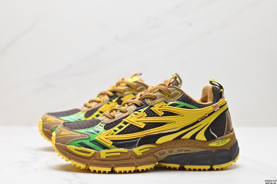 Angled side view showing the yellow overlay detailing, green accents, brown panels, black mesh, and chunky sole.
