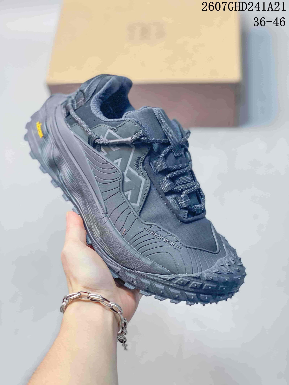 KOLON SPORT LIT CAMP sneaker in an all-dark charcoal colorway with textured panels and lugged tread.
