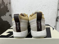 Rear view of cream and light grey Nike Book 1 sneakers with “CHAPTER ONE” heel tabs